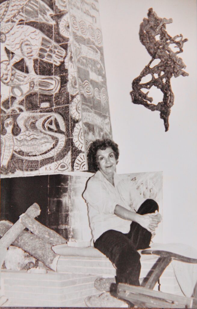 Kristin Saleri in front of Ceramic Mosai
